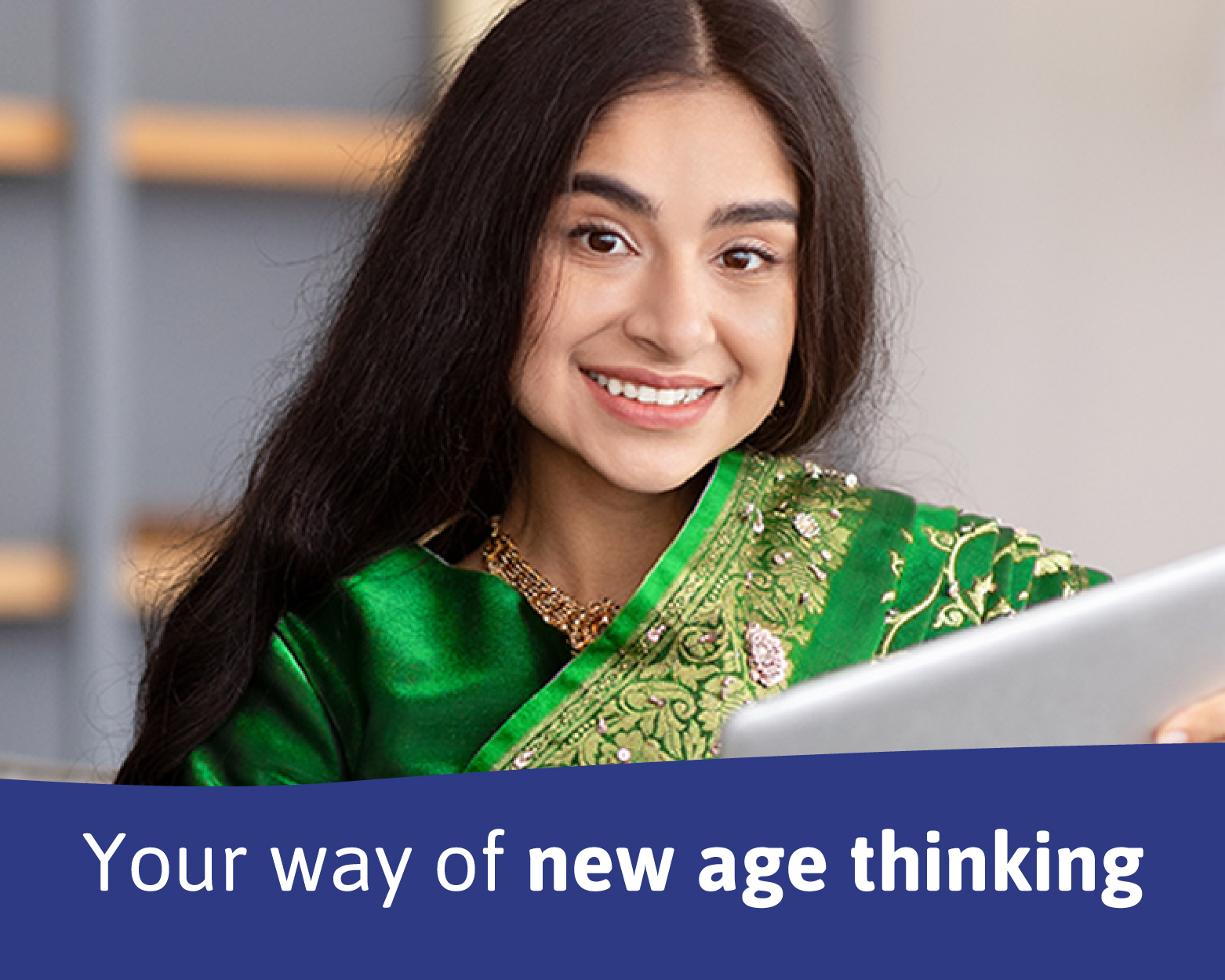 cute litte smiling girl with long hair wearing green saari holding tablet representing neo appliances care